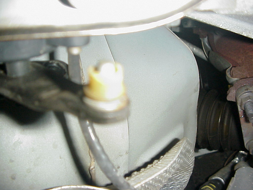 Photo of bushing with bad wear and tear
which caused the shifter linkage to fall off. 