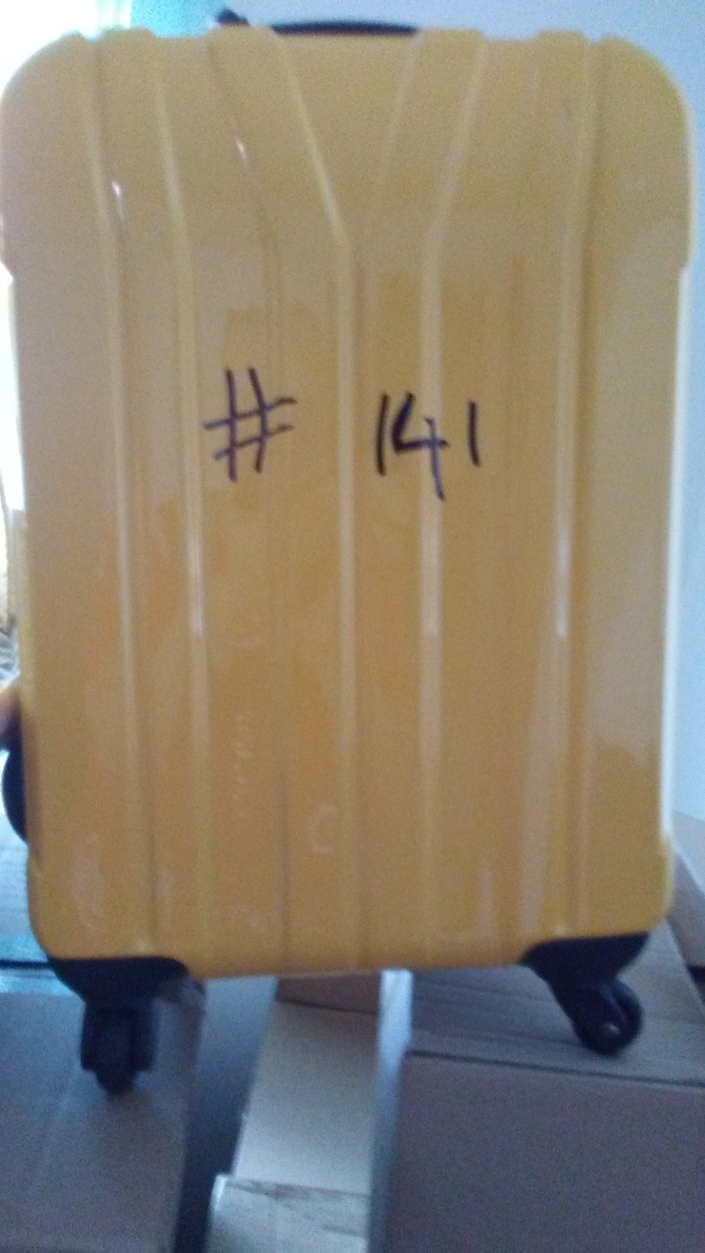 wrote on brand new brookstone suitcase