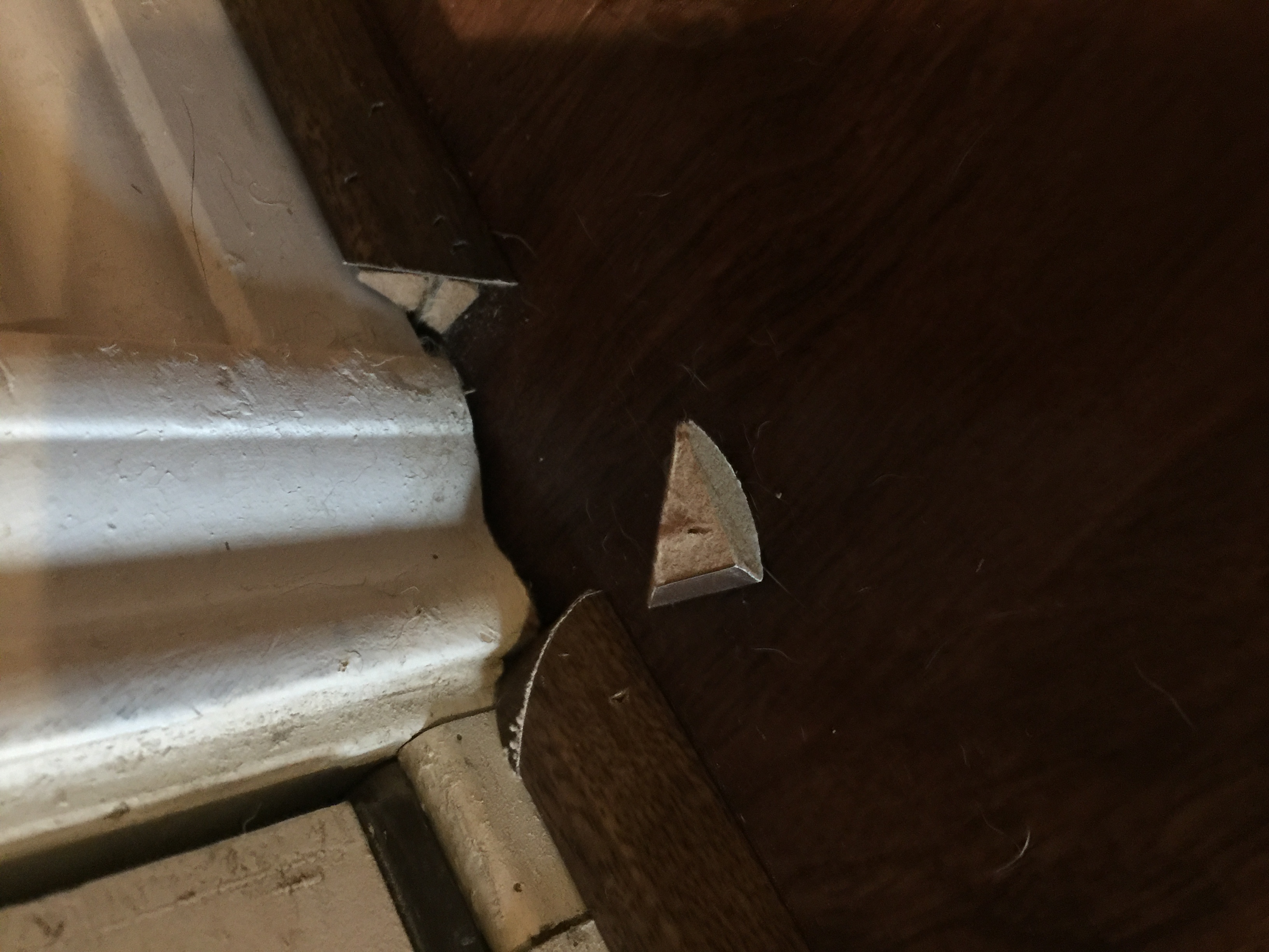 Corner piece not nailed in place.