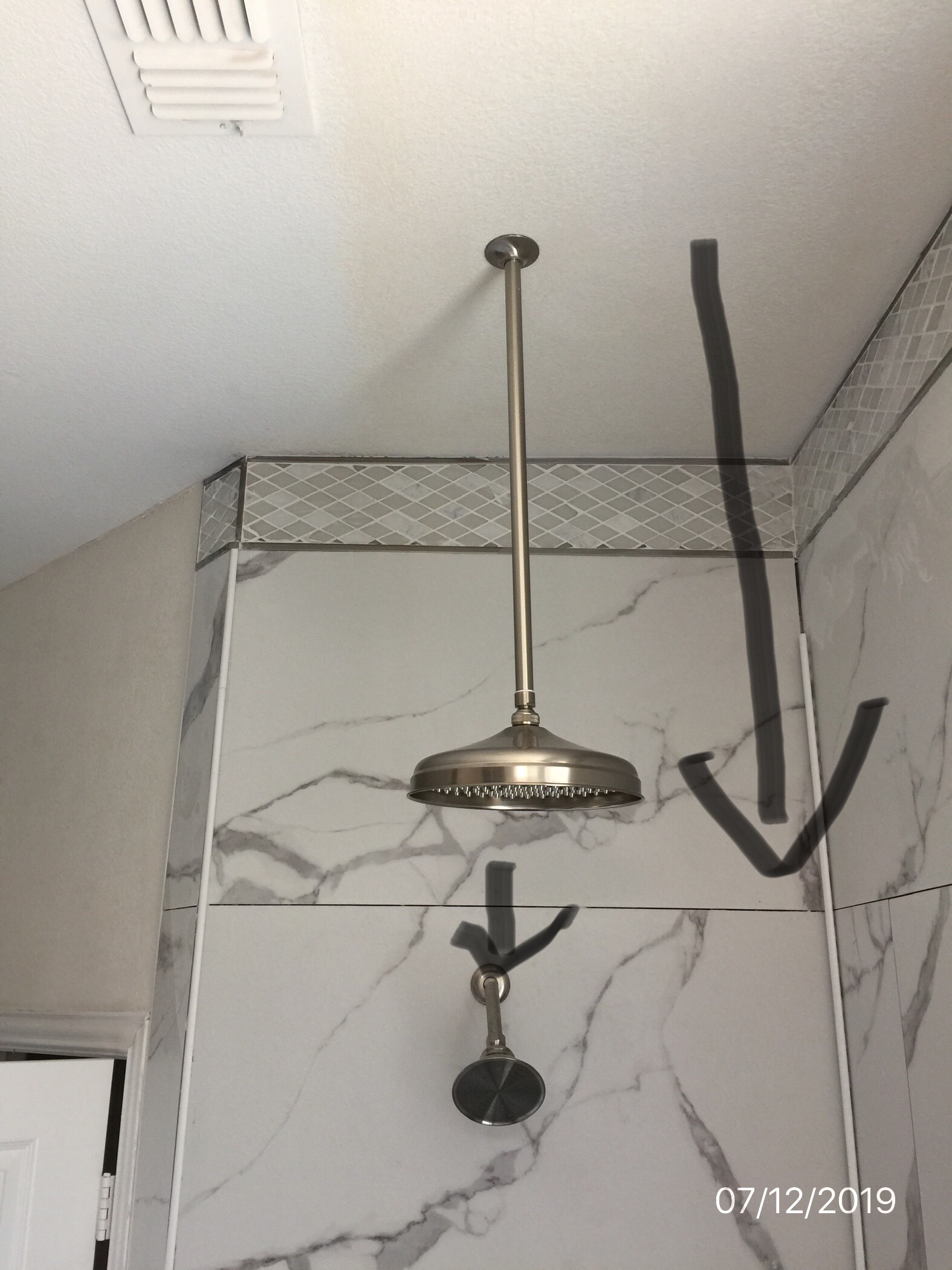 shower head crooked and not centered