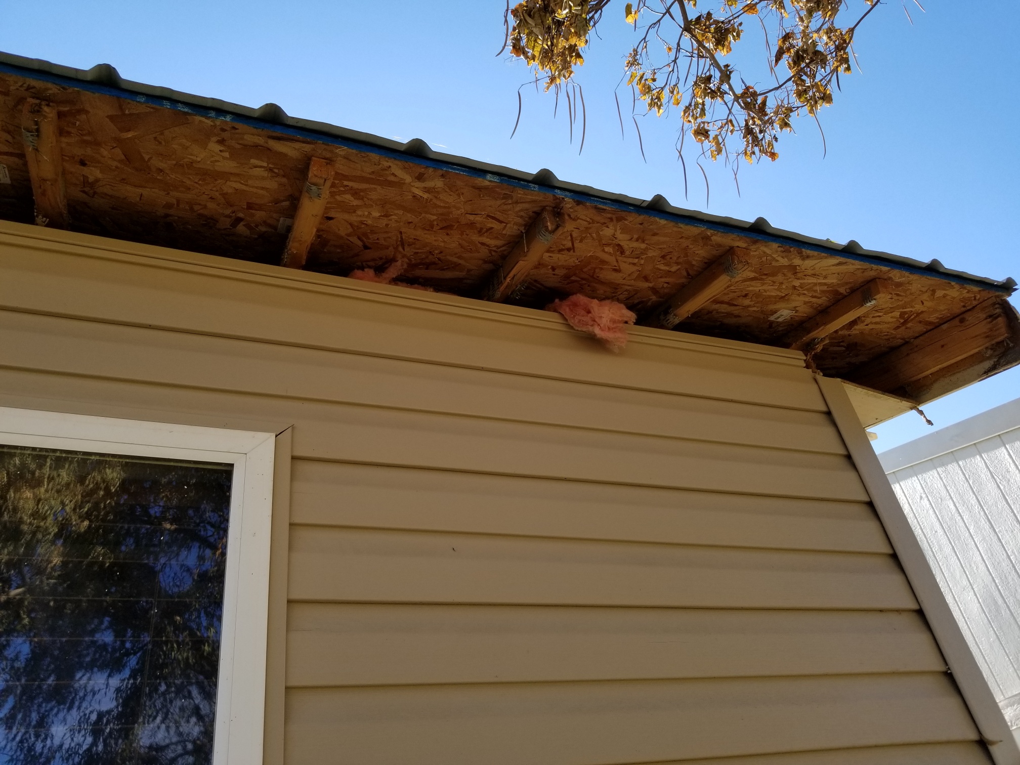 left roof open. Birds eating insulation