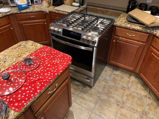 Oven can't open, too close to island.