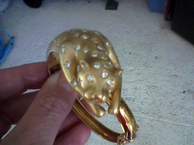 18 Kt gold Panther bracelet with 3.20 G VVS dia