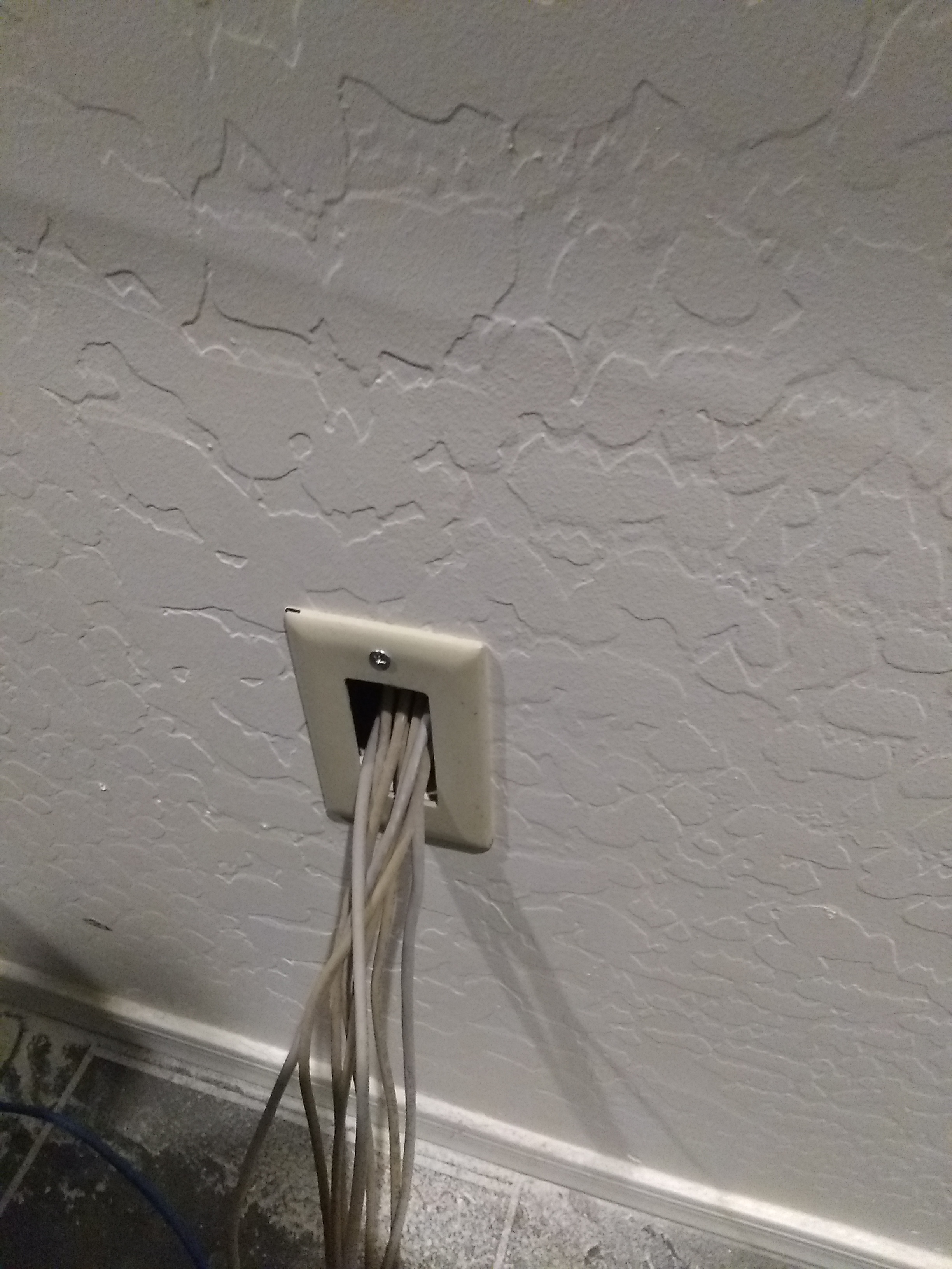 Bottom of wall where cables connected to DVR