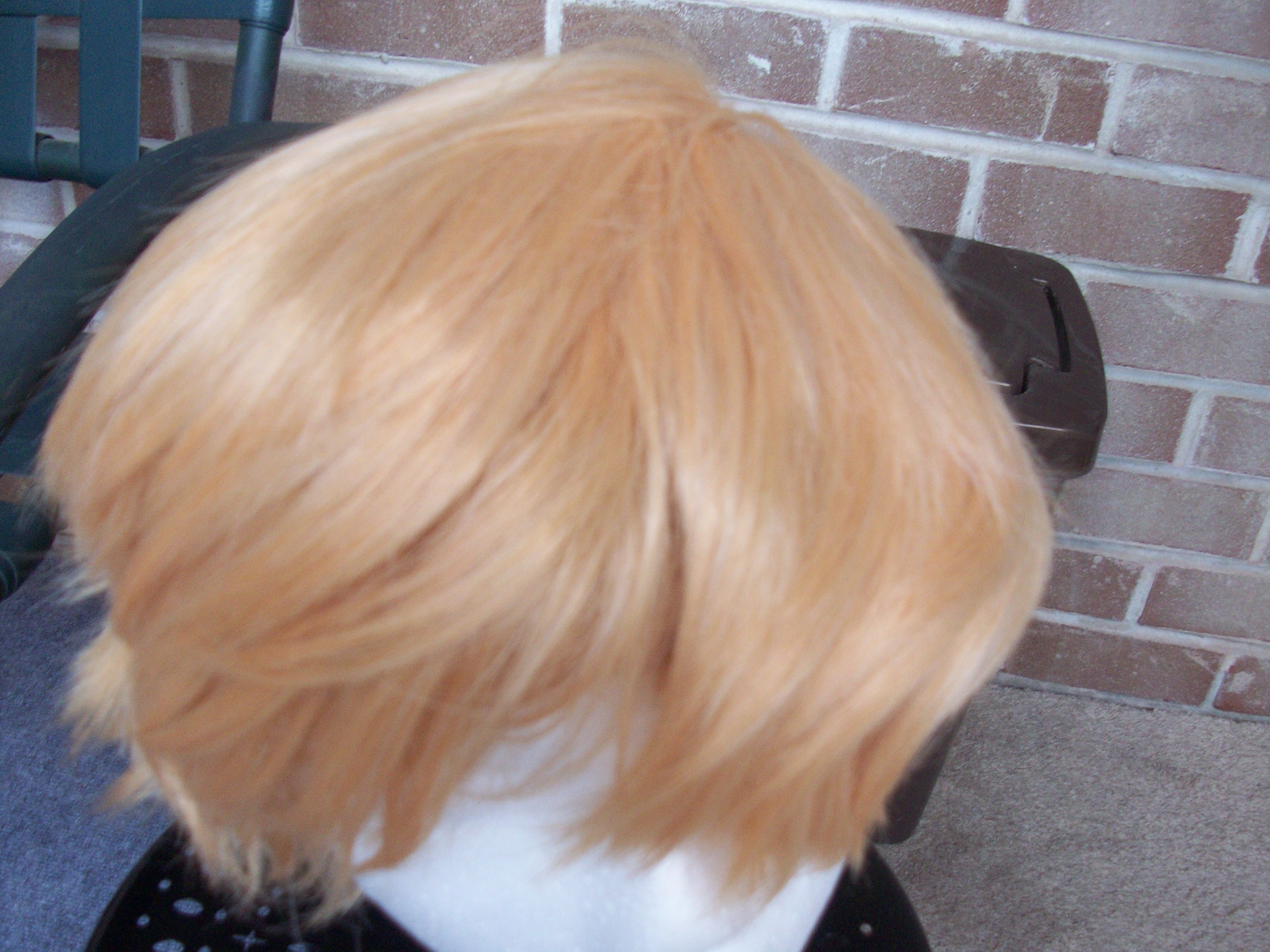 Wig is orange and very poor quality