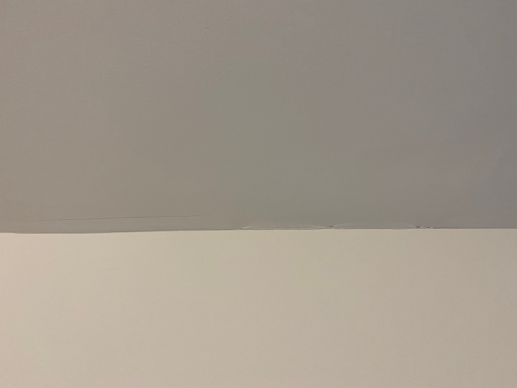 three foot long crack in ceiling and wall 