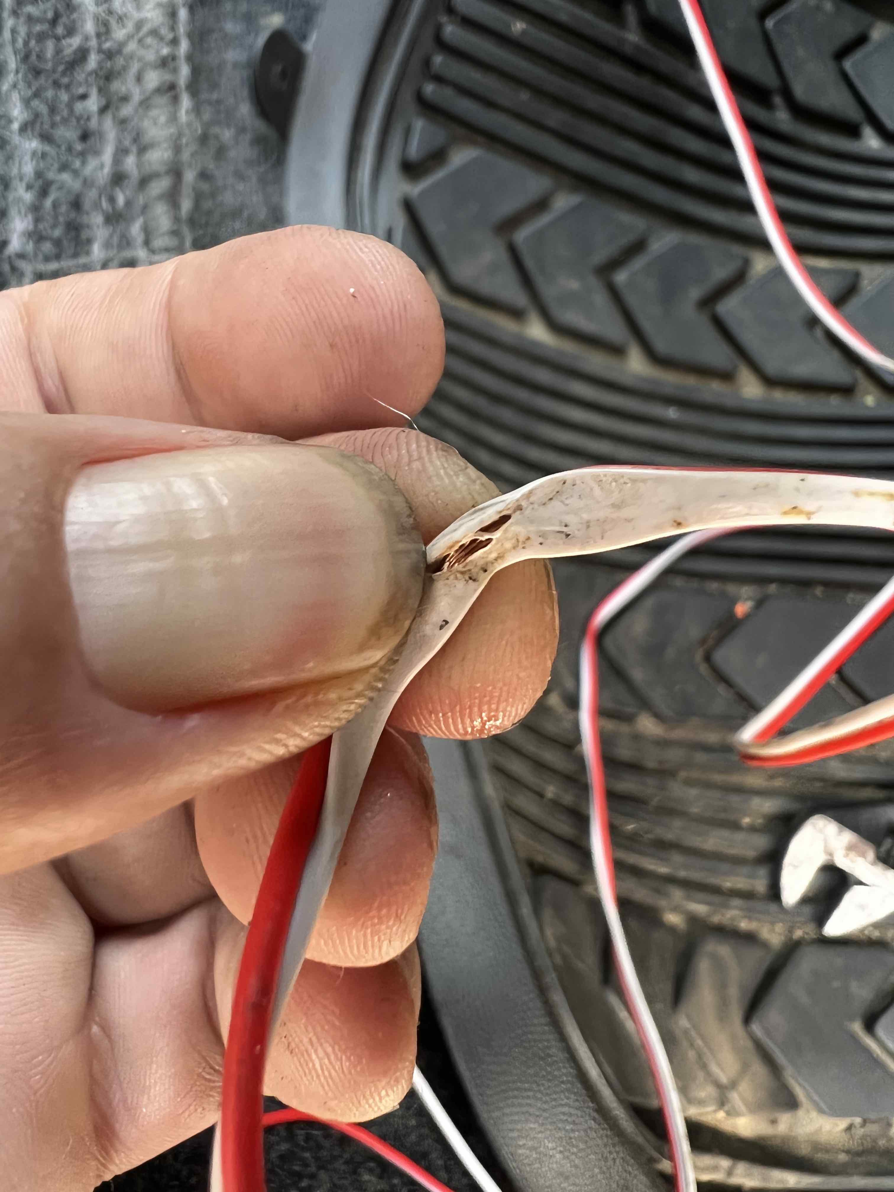 Exposed wire caused short in stereo