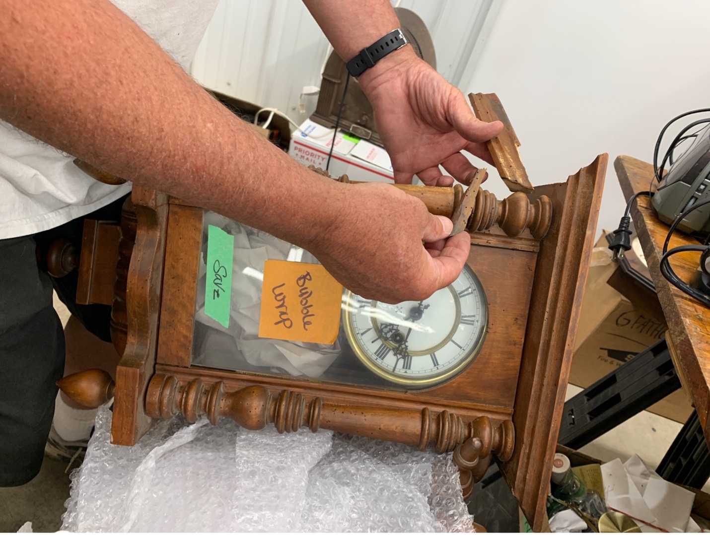 Broken antique clock due to poor packing