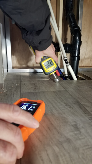 Moisture meter used to find wet OSB