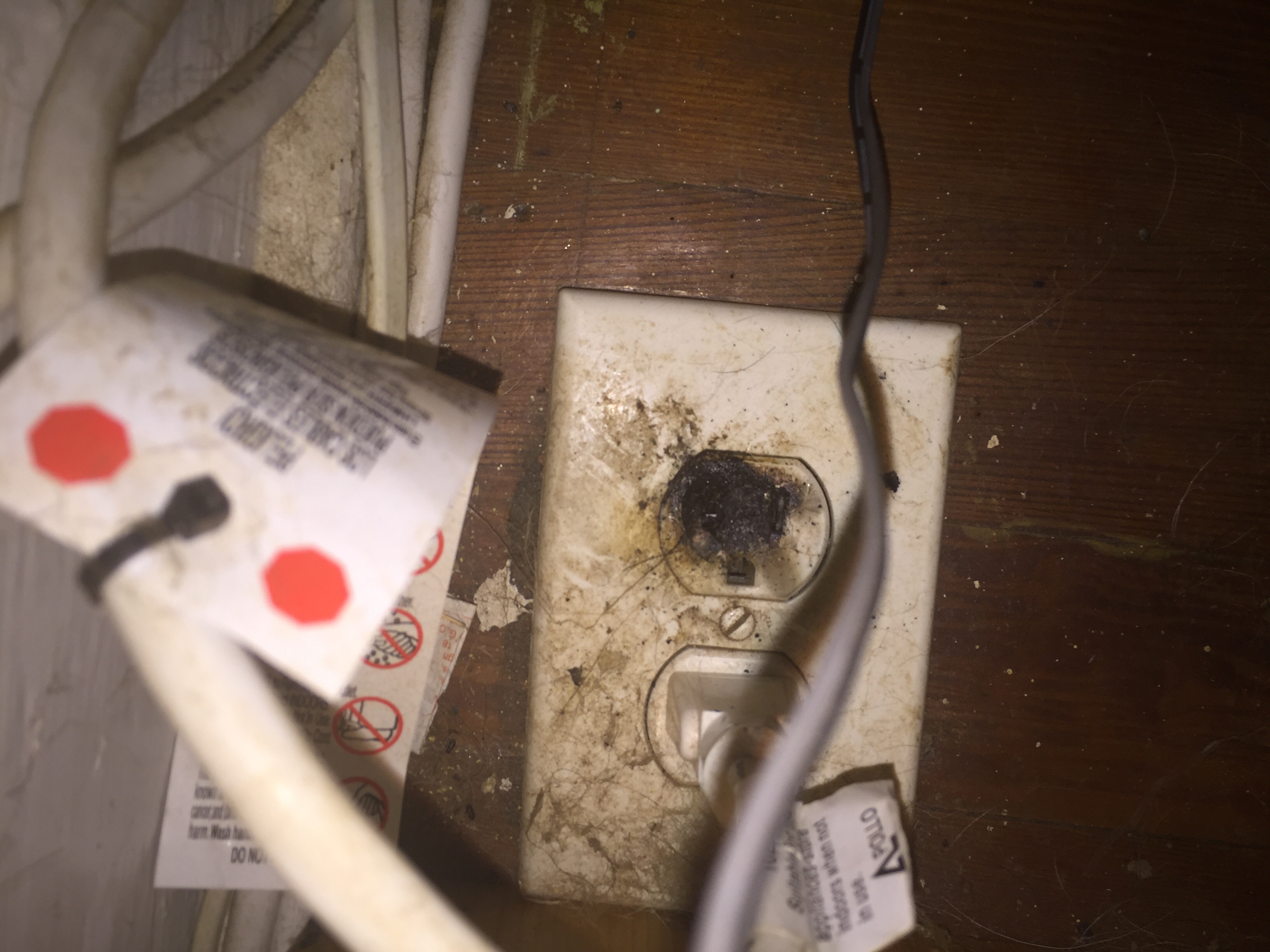 Burned out electrical socket due to electrical shortages 