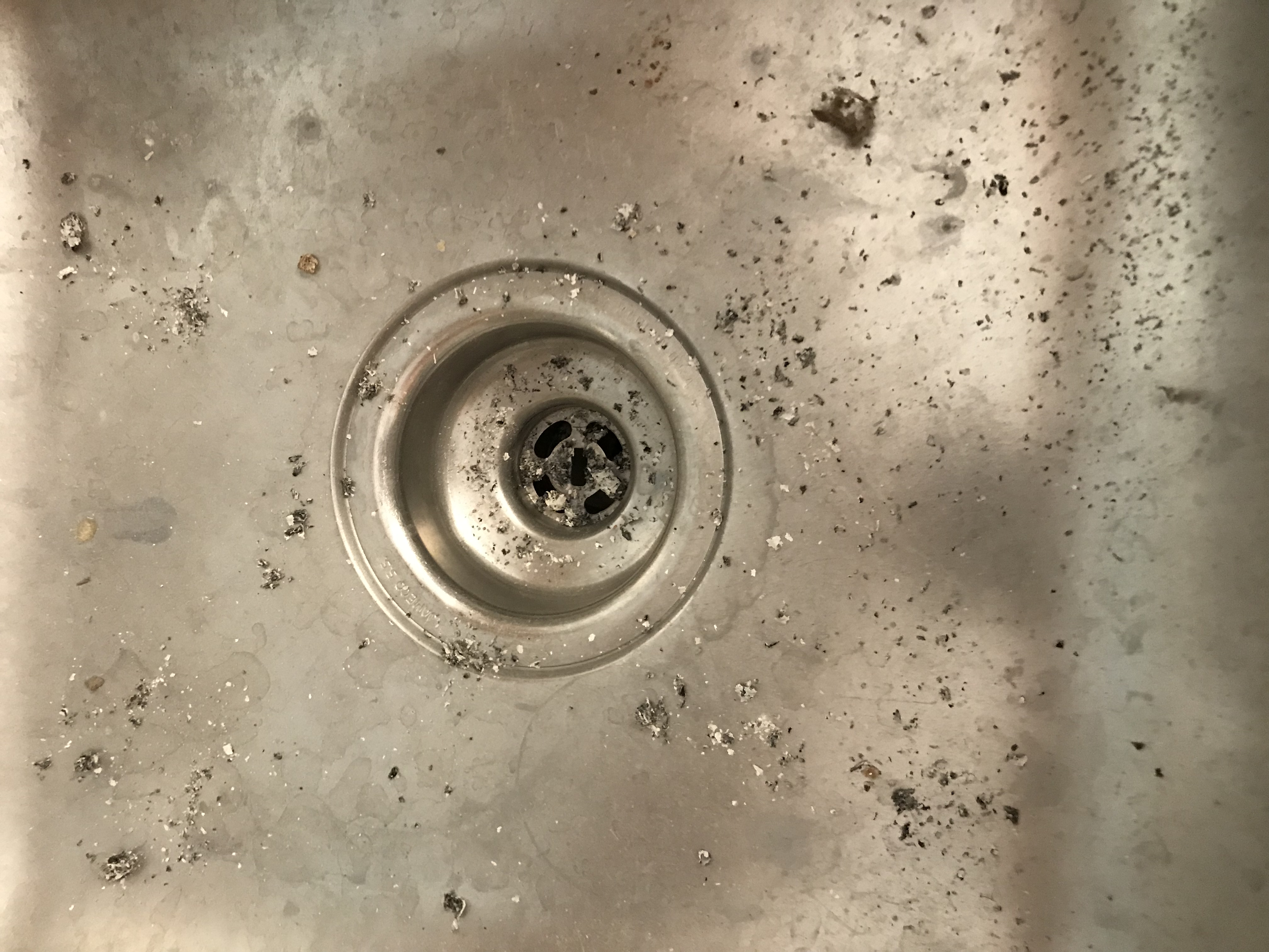 Cigarette Ashes in Kitchen Sink
