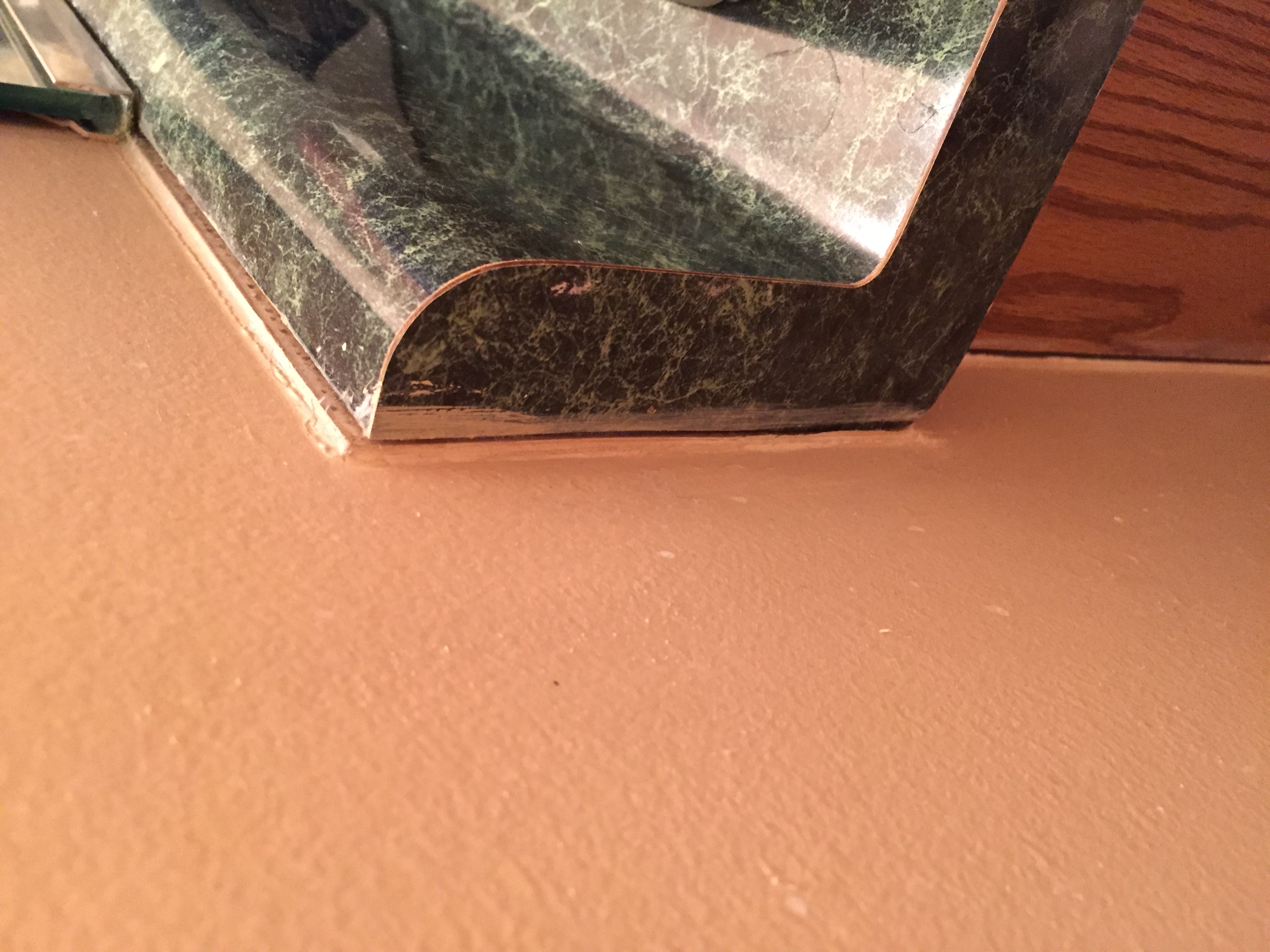Seperation of master bath countertop from wall