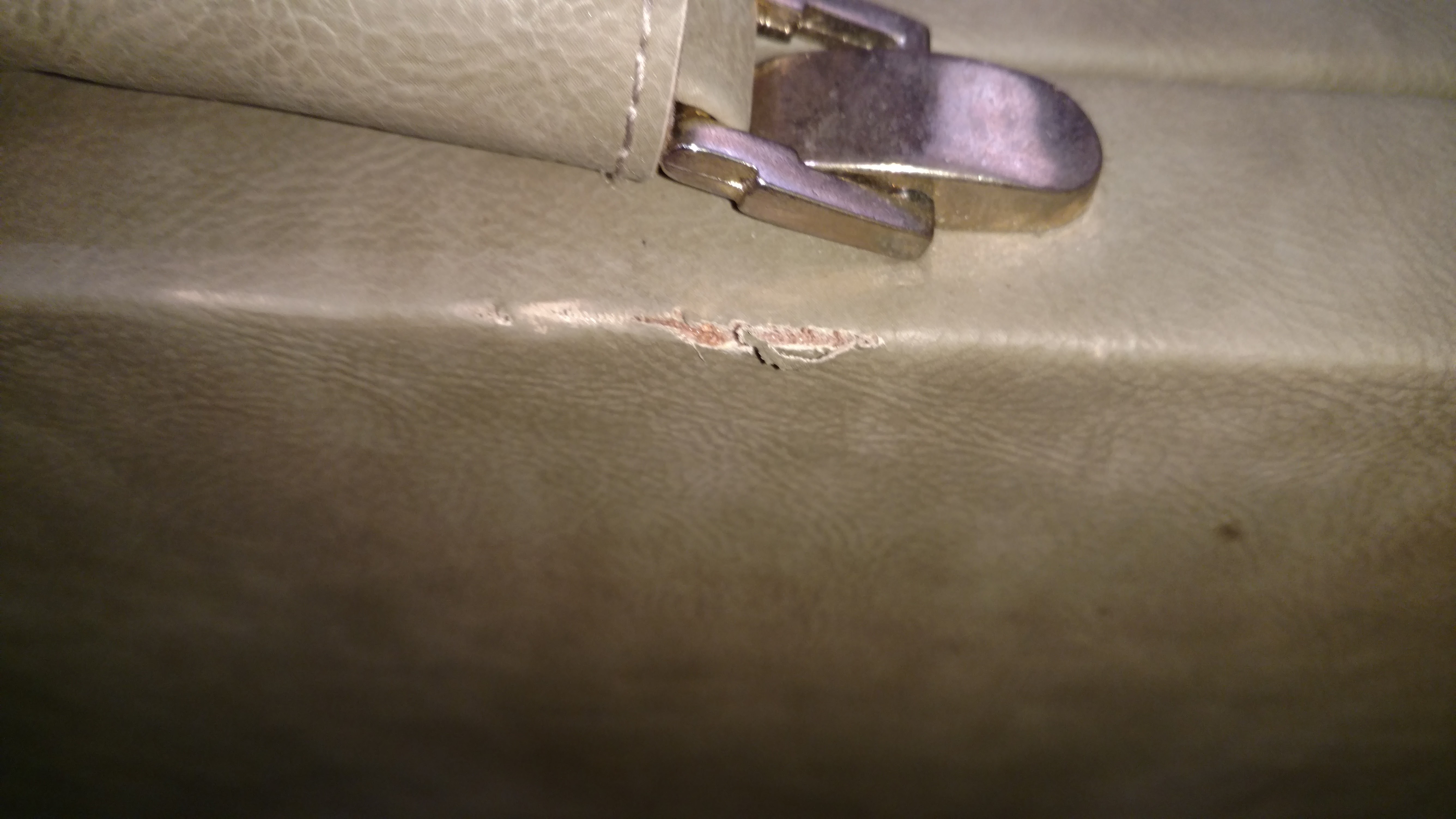 damage from suitcase being thrown in 