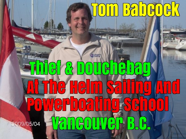 Tom Babcock At The Helm Sailing And Powerboating