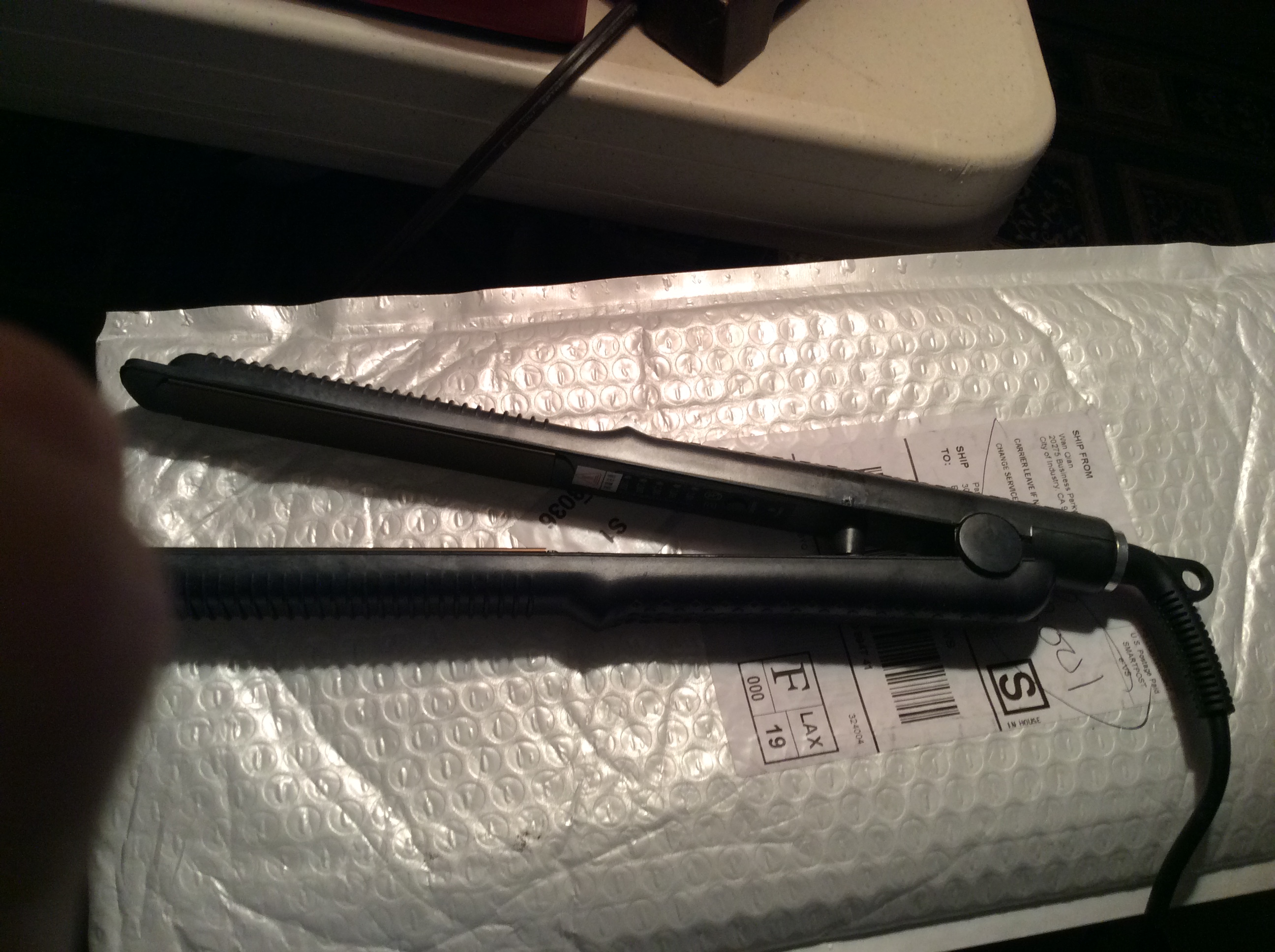Suppose to be a curling iron, this is a flat iron.