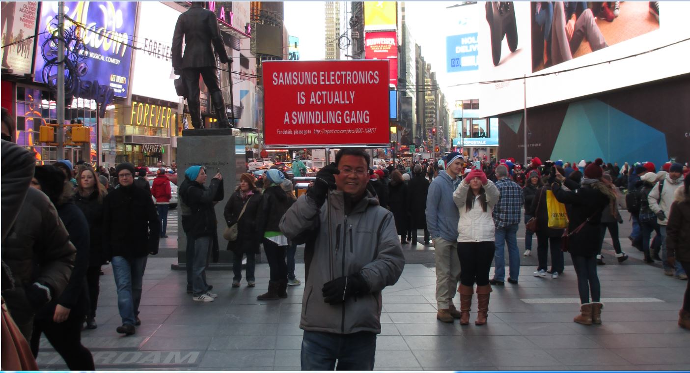 I was holding a Sign in Times Square in Dec. 2014