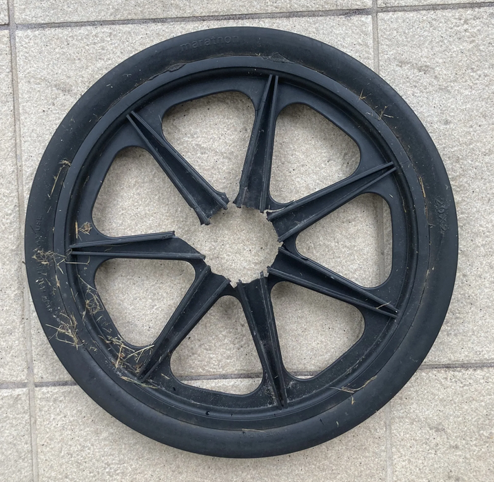 Broken plastic wheel from patty's pony place cart