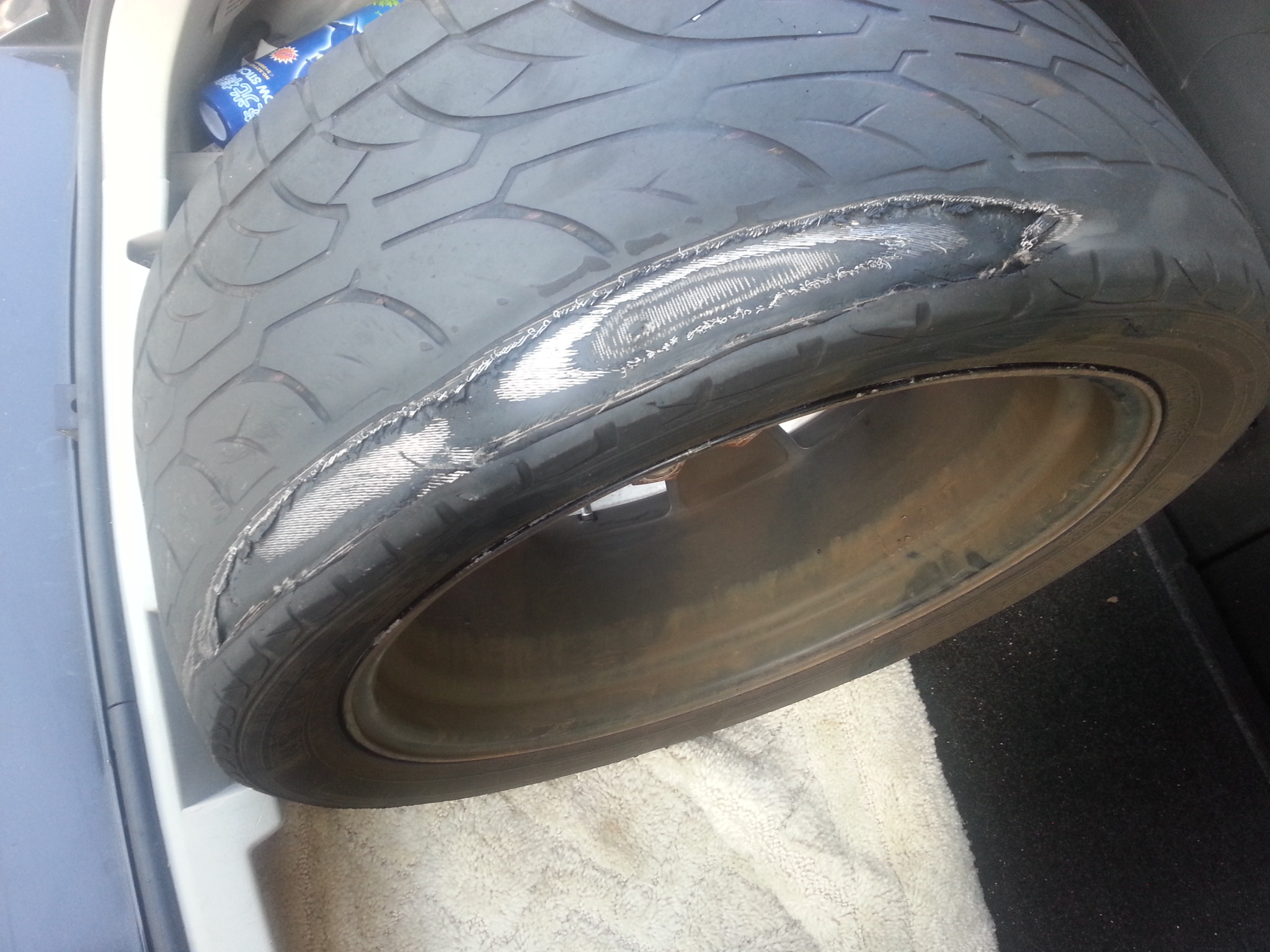 Here is the tire after I took it off and put it in my trunk to bring back to Sears and show them.