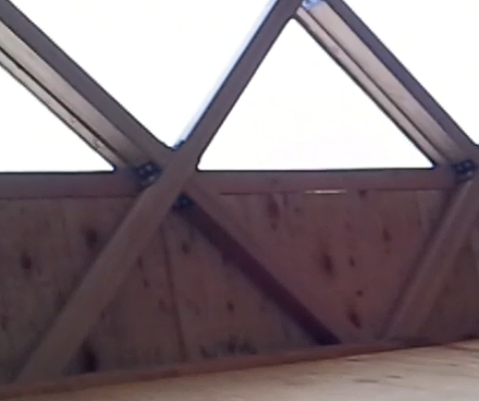 Here is a pic where you can see out through the roof (see the light coming through the wood)?