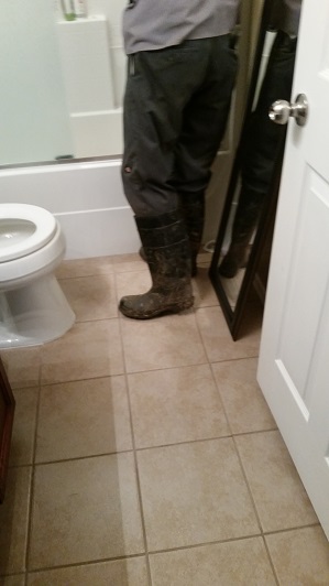 This is a picture of the plumber, while he was not looking, who proceeded to walk through the house with human excrement covering his boots. This was extremely disgusting and Homes 4 Lease still refus
