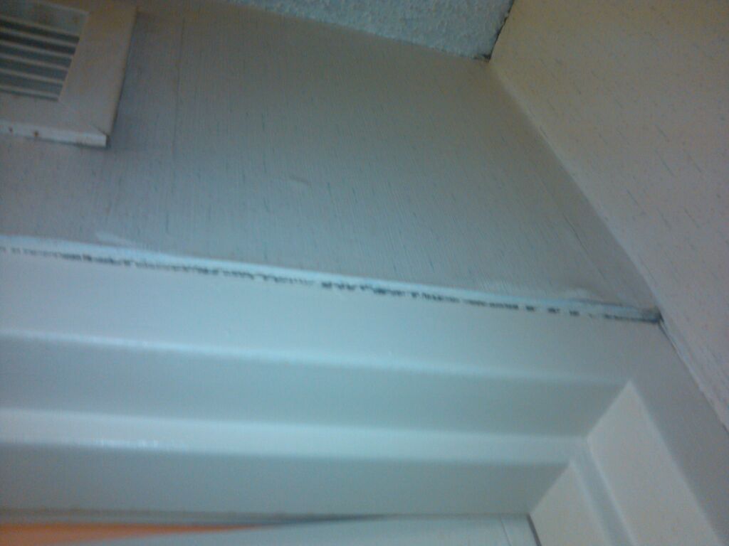 More black stuff in the ceiling creaves. No, its not the same areas. The blk stuff is just everywhere. I think they thought it was trim.