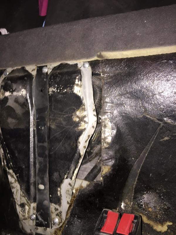 Another one of how under my back seat looks 
They left openings on both sides tht LEAD 
DIRECTLY TO THE GAS TANK....VERY DANGEROUS.....Thats why I smell gas fumes in my car....UNBEARABLE....