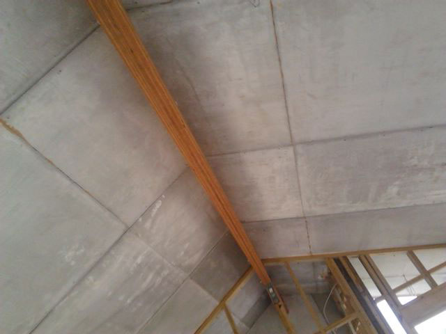 Showing the seams in the supplied roof panels not staggered as called for by the engineeer