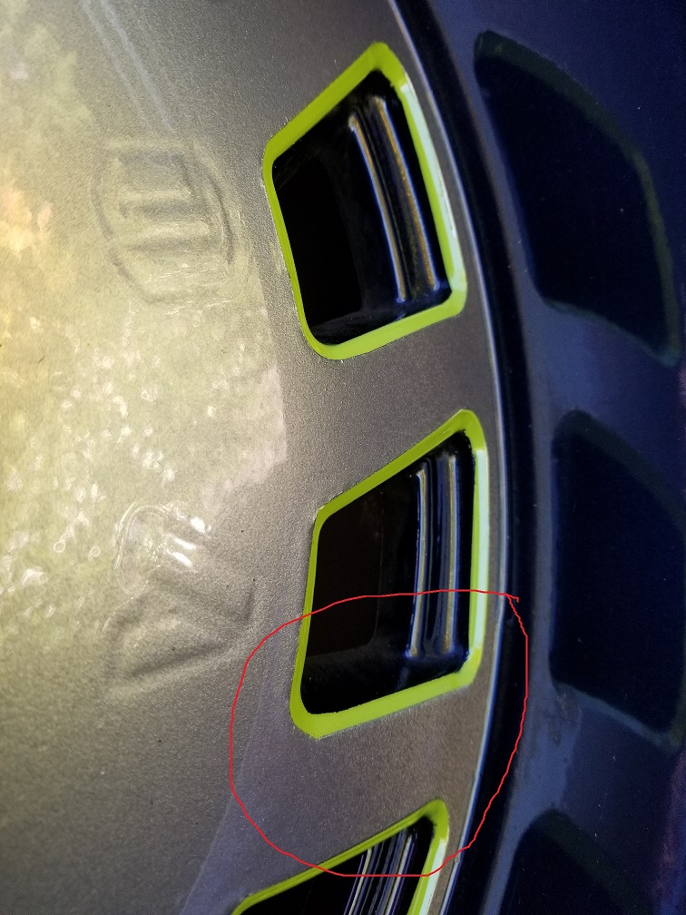 Incomplete paint coverage on all five wheels