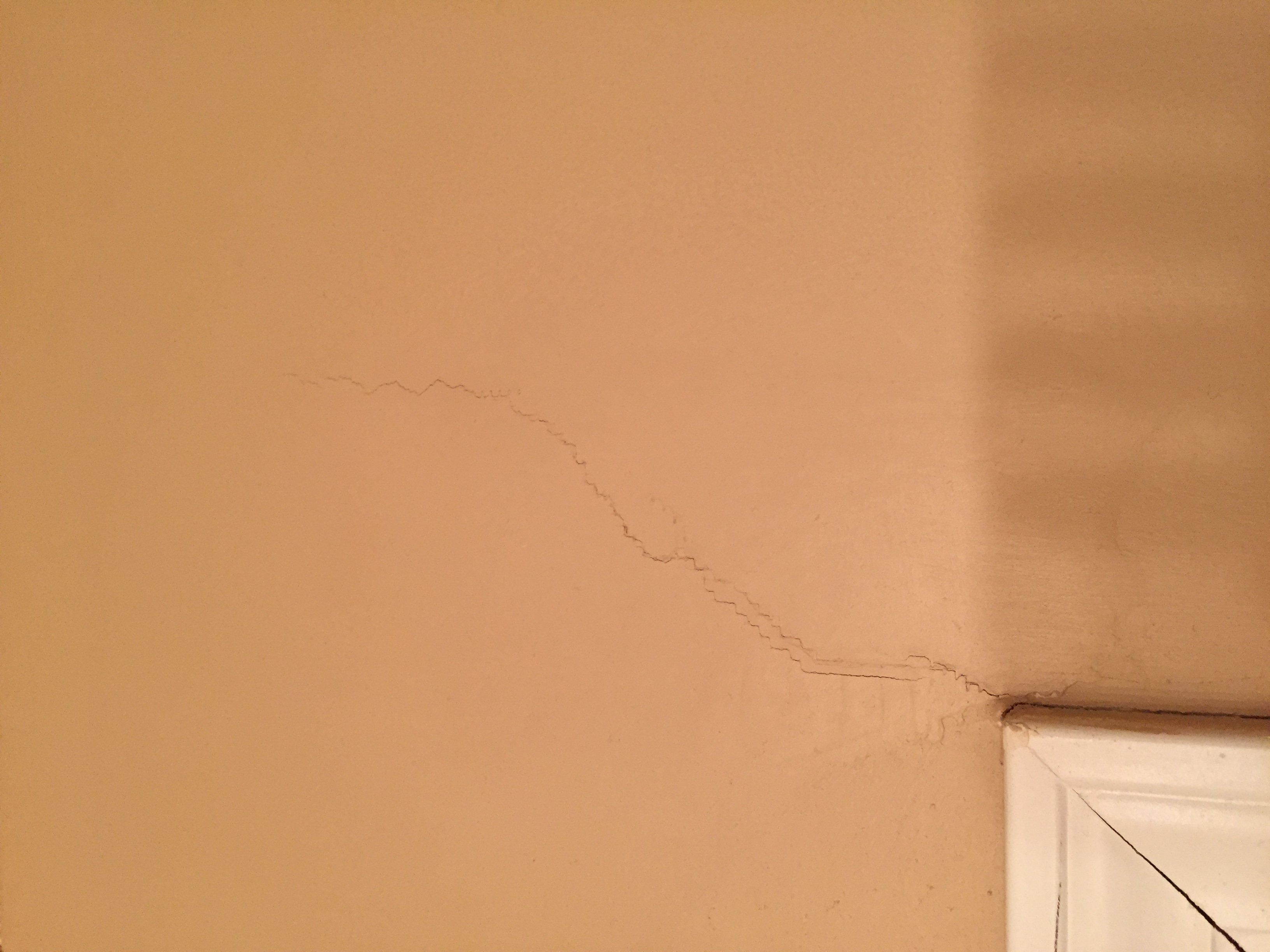 Crack above master bath door