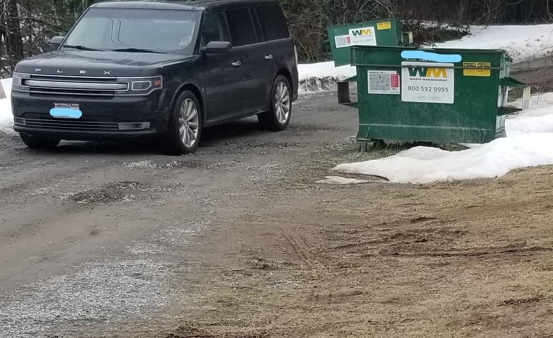 Our actual road and dumpster the next day