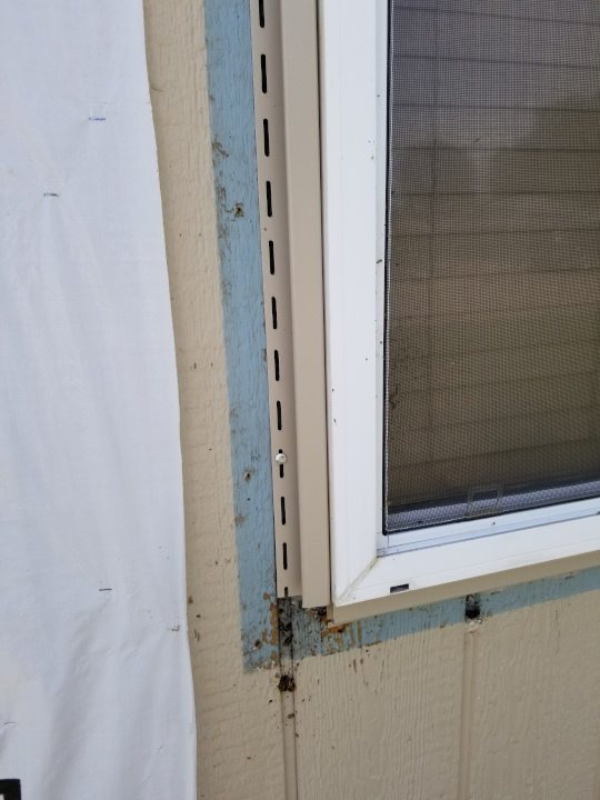He installed a trim piece with no water flashing 