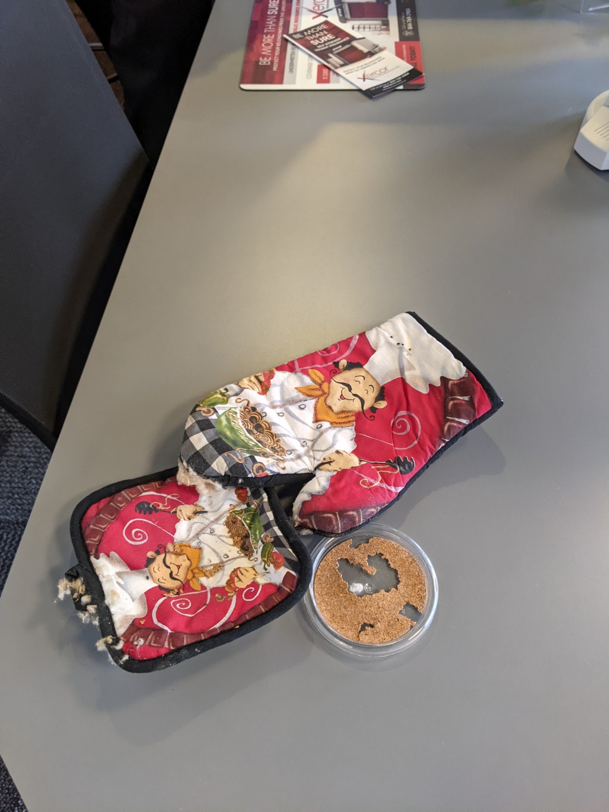 Damaged pot holders & drink coaster from rats. 