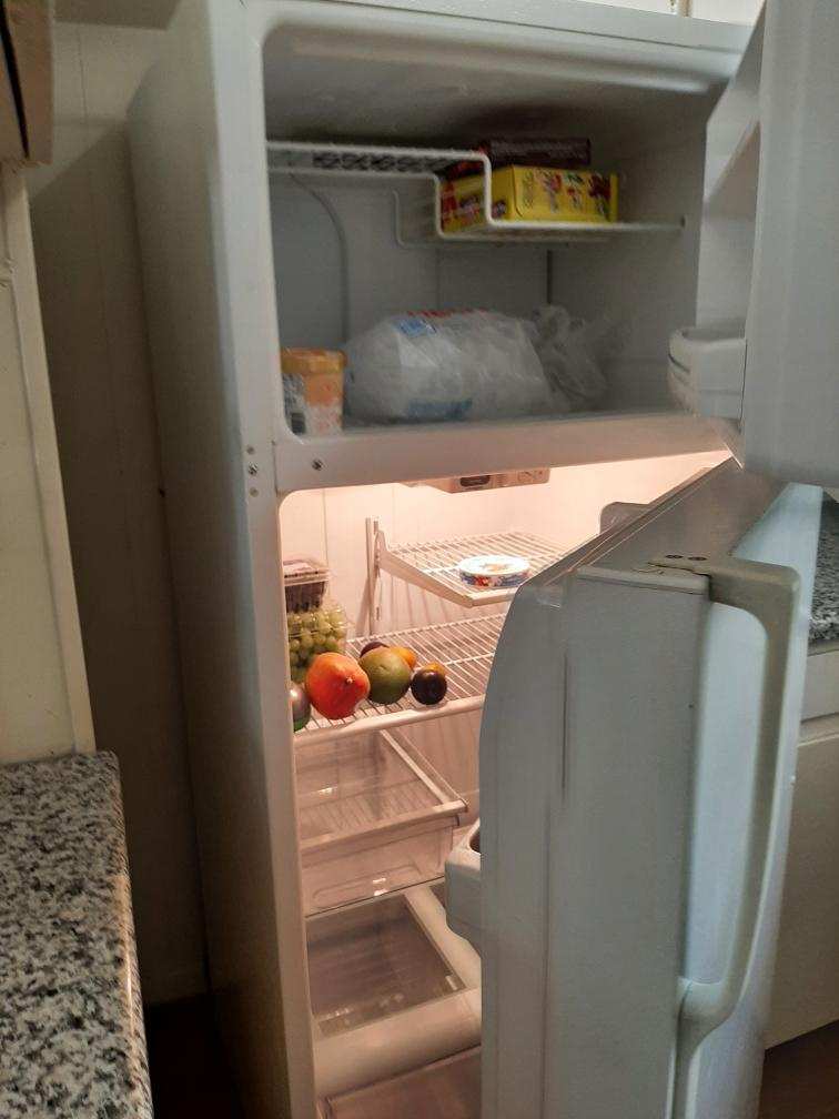 Fridge filled with belongings AFTER cleaning