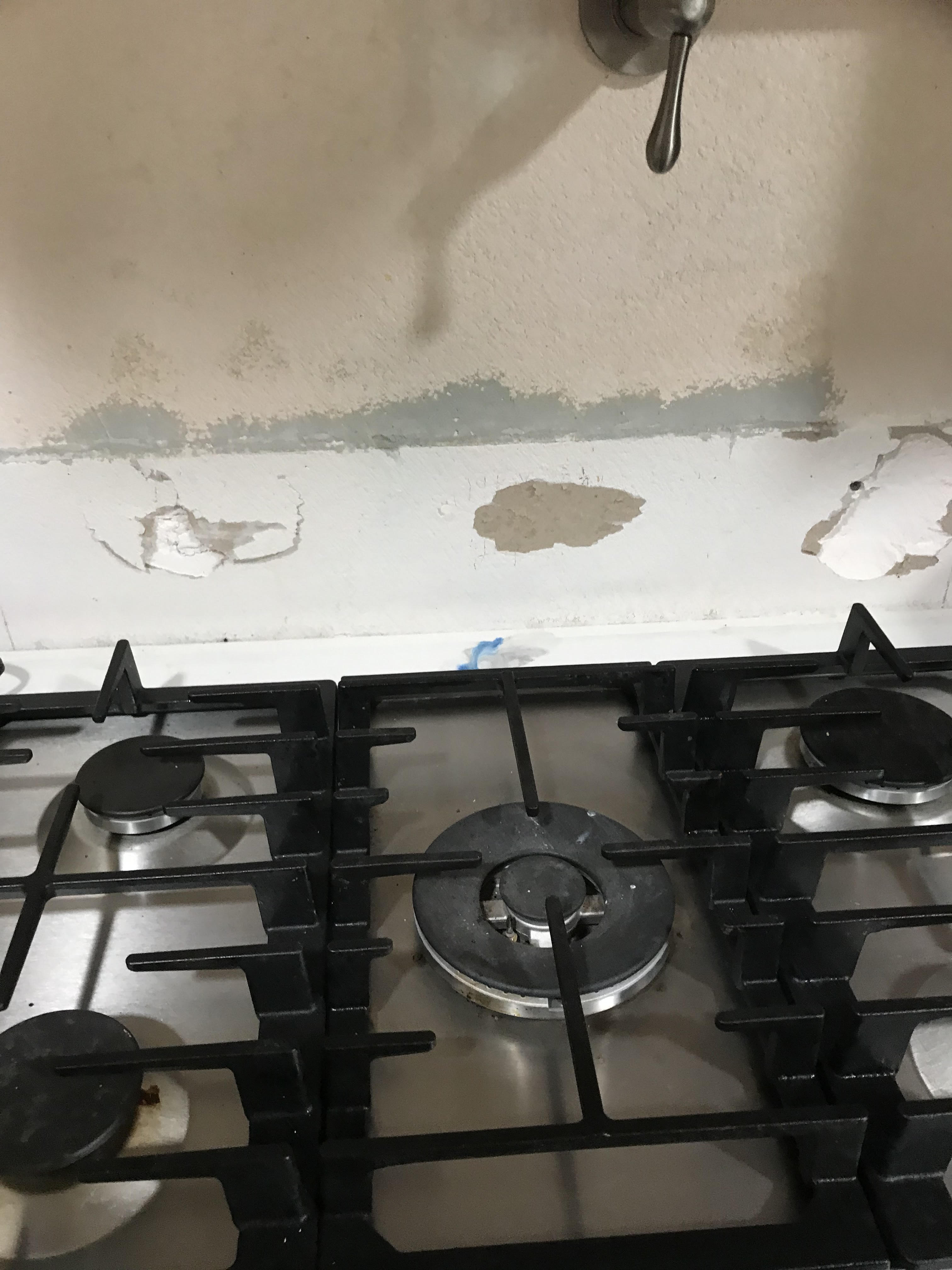 damage behing the cooktop