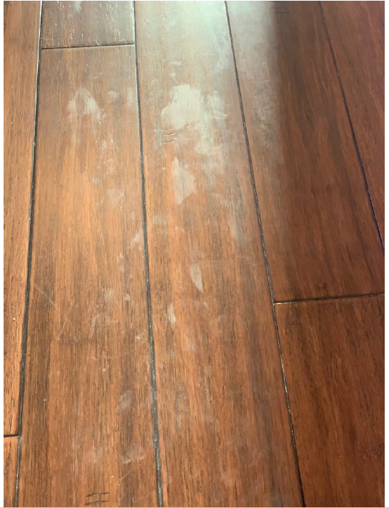 Adhesive Damage to the brand new hardwood floors 