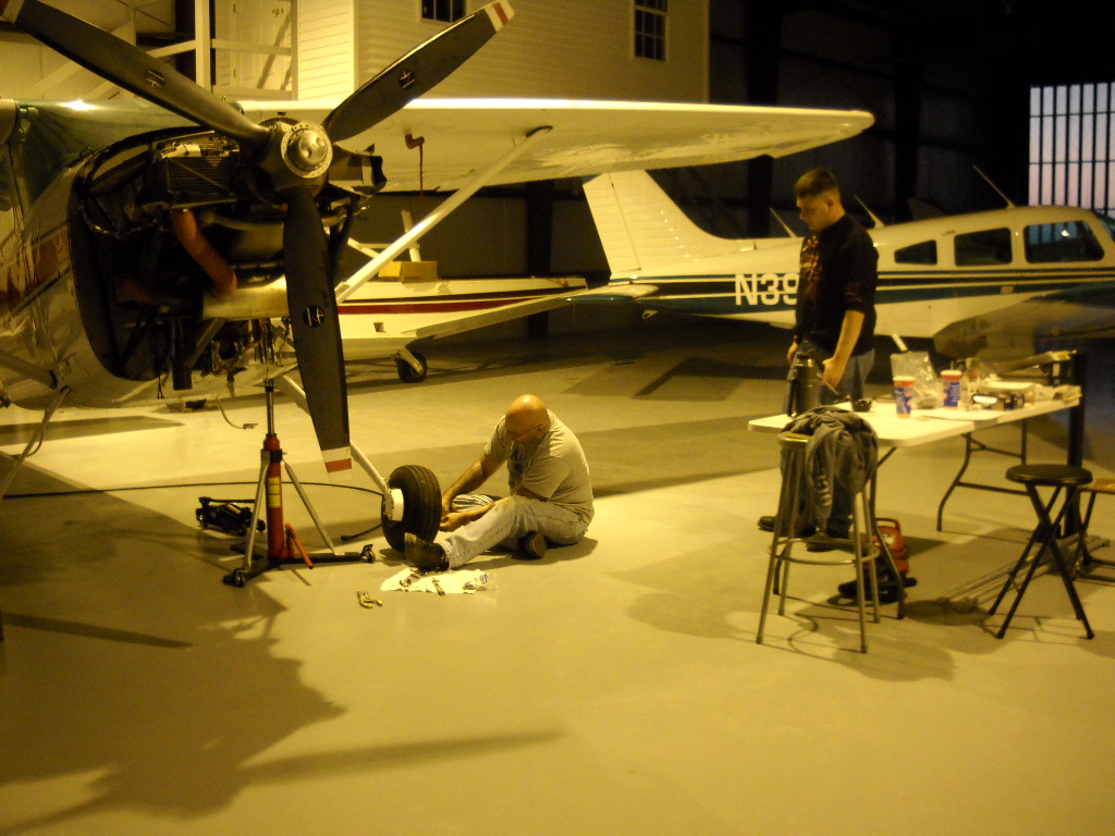 ME & MY SON WORKING A 185 SEAPLANE ANNUAL IN OUR HANGER